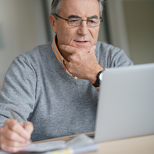 Three Rivers patient using Patient Portal on the computer.